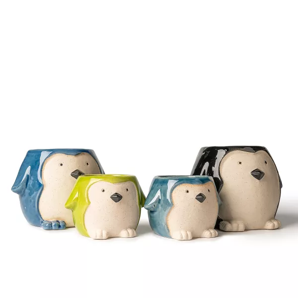 Pinguino formako zeramikazko kandela-euskarria